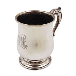 1930s silver mug, of waisted form with engraved monogram to body, with acanthus capped scroll handle, upon a stepped circular foot, hallmarked William Neale & Son Ltd, Birmingham 1931, H9.5cm