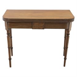 Mid-19th century mahogany console table, featuring extending fold-over top with double rear gate-leg action, raised on turned legs