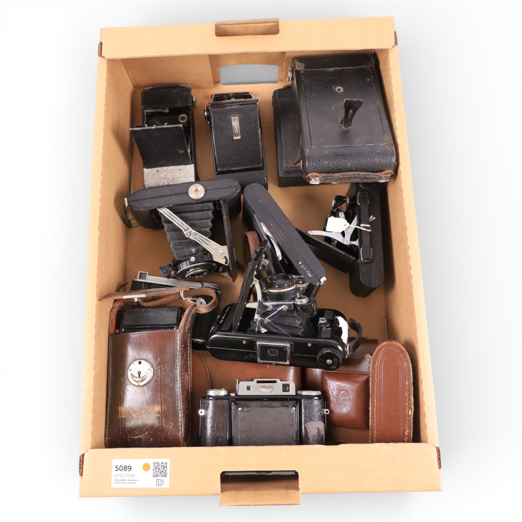 Collection of folding cameras, including Kershaw, Hapo45, Coronet and Ilex examples