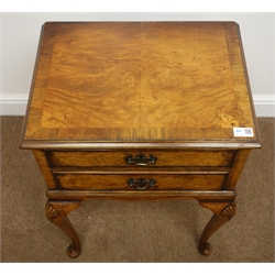  Early 20th century cross banded two drawer walnut lamp table, shell carved cabriole legs, pad feet, W50cm, H72cm, D37cm   