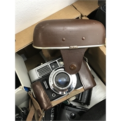 Large quantity of camera equipment in three boxes - Panasonic ZOOM C-900ZM 35mm camera, PENTAX sportmatic camera, RICOH 500 ME camera, Canon EOS 500N camera and lens boxed, Voigtlander VITO CLR camera, MAMIYA 16 camera, KODAK SIX-20 Junior, Minolta RIVA zoom 105i camera, PETRI 7 S camera, KODAK Duo 620 camera, Polaroid 600 Land Camera Spirit, auto teleplus 2x converter, Prinzflex auto 1:2.8, CANON zoom lens 80-200mm, various other cameras, lenses and cases
