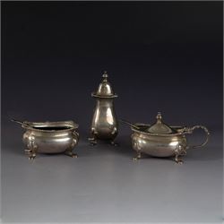 Mid 20th century silver three piece cruet set, comprising pepper shaker, open salt, mustar...