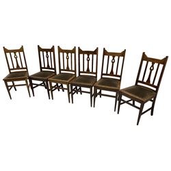 Set of six early 20th century oak dining chairs, shaped and heart pierced vertical splat, on square tapering front supports 