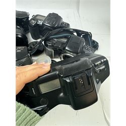 Six Minolta Dynax SLR camera bodies, comprising 800si serial no. 62703606, three 7xi examples, including one boxed example, serial nos. 20106944, 16123311 & 22107553, and two 9xi examples, serial no. 18209901 & 18202113, with three Minolta lenses, including Zoom xi 28-105mm 1:3.5(22)-4.5 lens, AF Zoom 28-85mm 1:3.5 (22)-4.5 lens and an AF Zoom 75-300mm 1:4.5(32)-5.6 lens, Hama carry case and other accessories