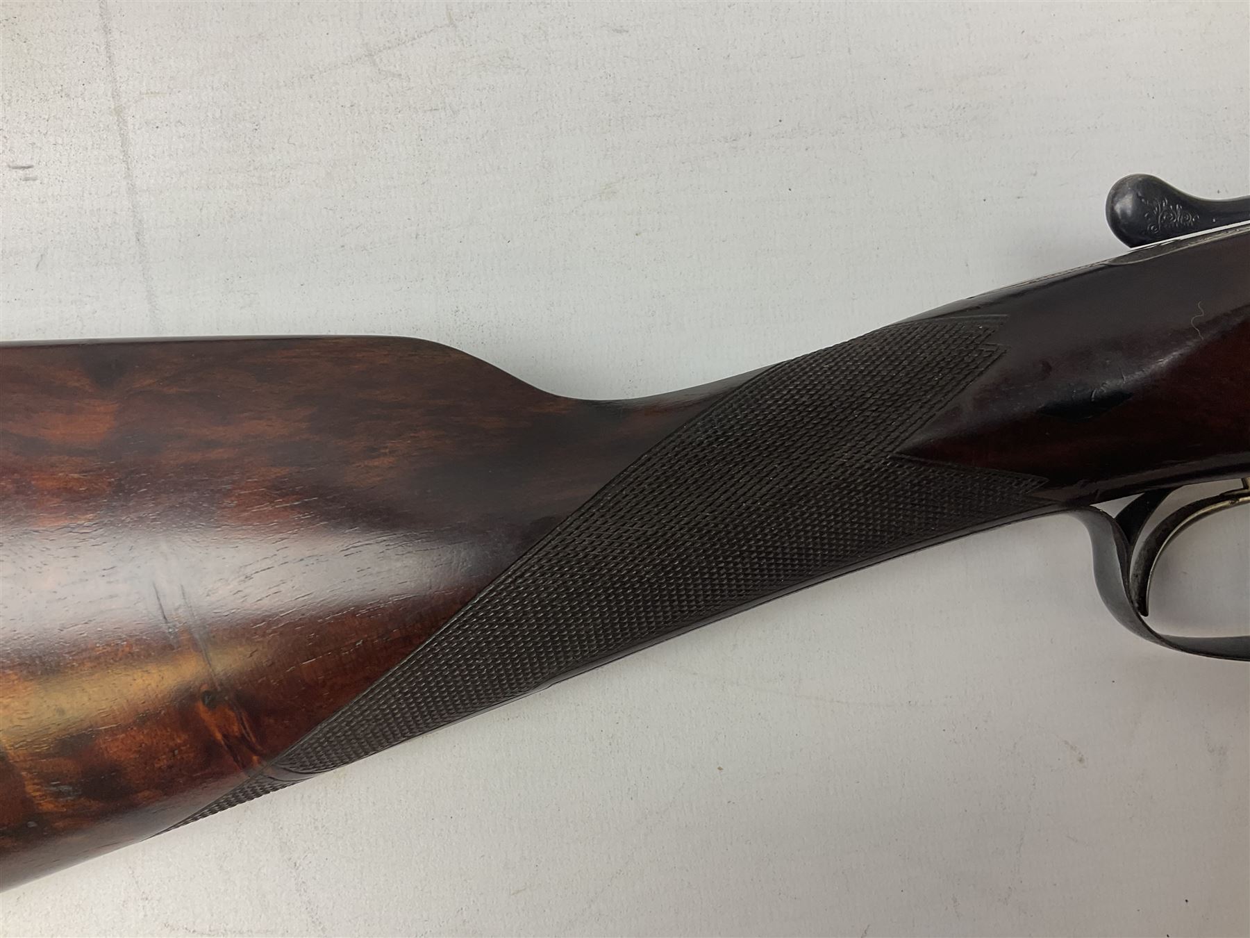 W.W. Greener 12-bore side-by-side double barrel non-ejector shotgun, with 76cm barrels, side safety, engraved lock, figured walnut stock with chequered grip and fore-end, no.33408, 120.5cm overall; in fitted canvas covered case with tools and accessories including .22 12-bore dog training device. SHOTGUN CERTIFICATE REQUIRED.