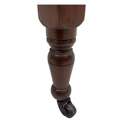 Victorian oak occasional table, octagonal top with bevelled edges, lower section fitted with a square undertier united by decorative shaped stretchers, on turned supports with castors