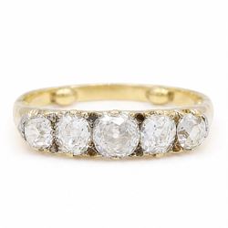 Early 20th century 18ct gold diamond ring, set with five graduating old cut diamonds and d...