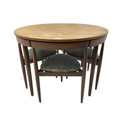 Hans Olsen for Frem Røjle - mid-20th century Danish teak 'Roundette' dining set, comprising a circular dining table raised on four tapering supports, paired with four matching chairs, each with a triangular seat upholstered in floral patterned fabric and raised on three tapering supports