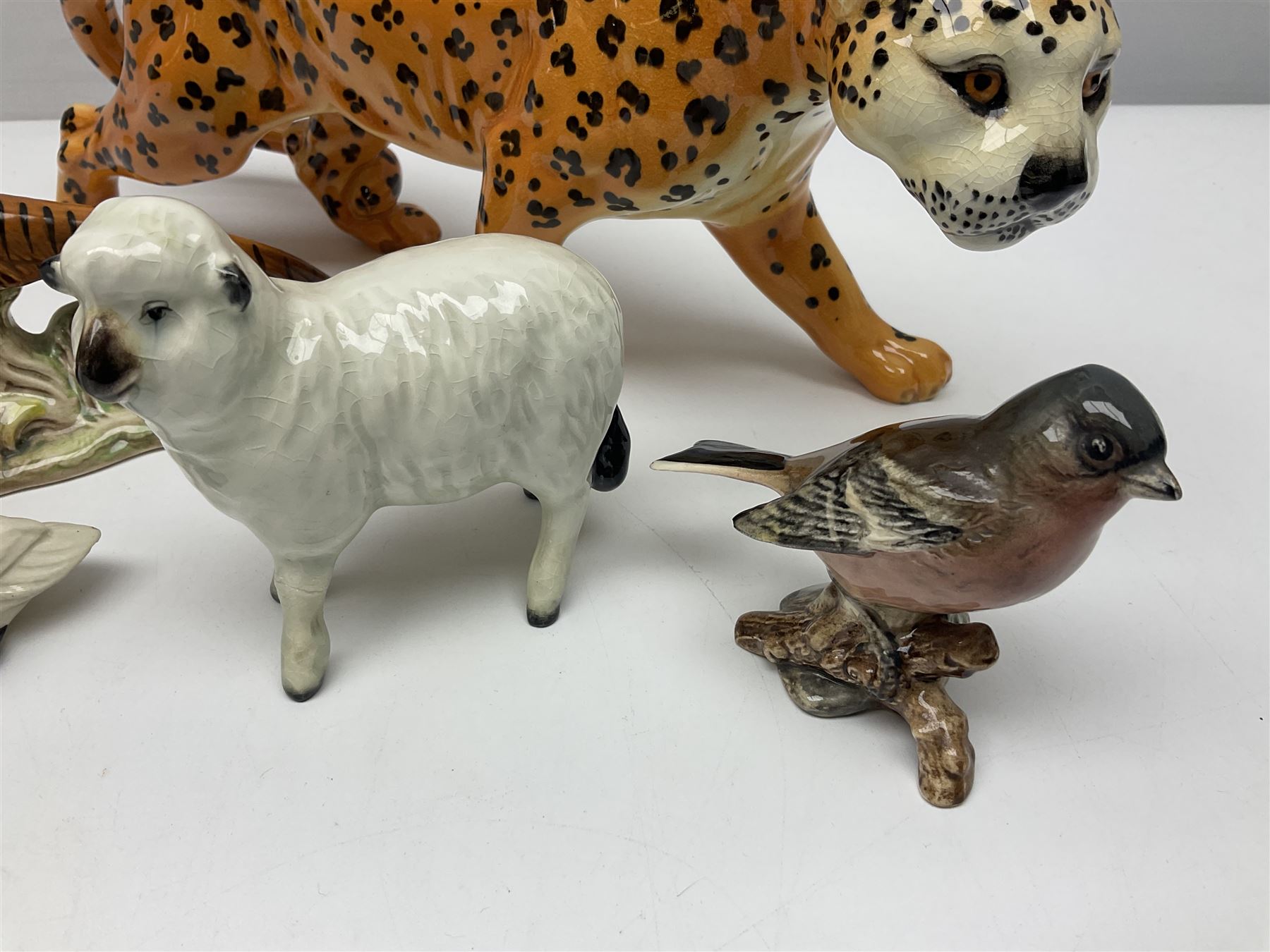 Group of Beswick figures to include leopard no 1082, rabbits, swan, pheasant no 1226 etc, all with marks beneath