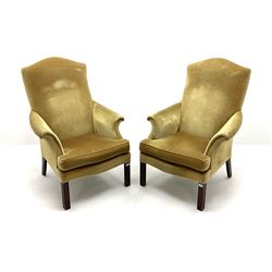 Pair Parker Knoll armchairs, upholstered in mustard yellow, square shaped supports