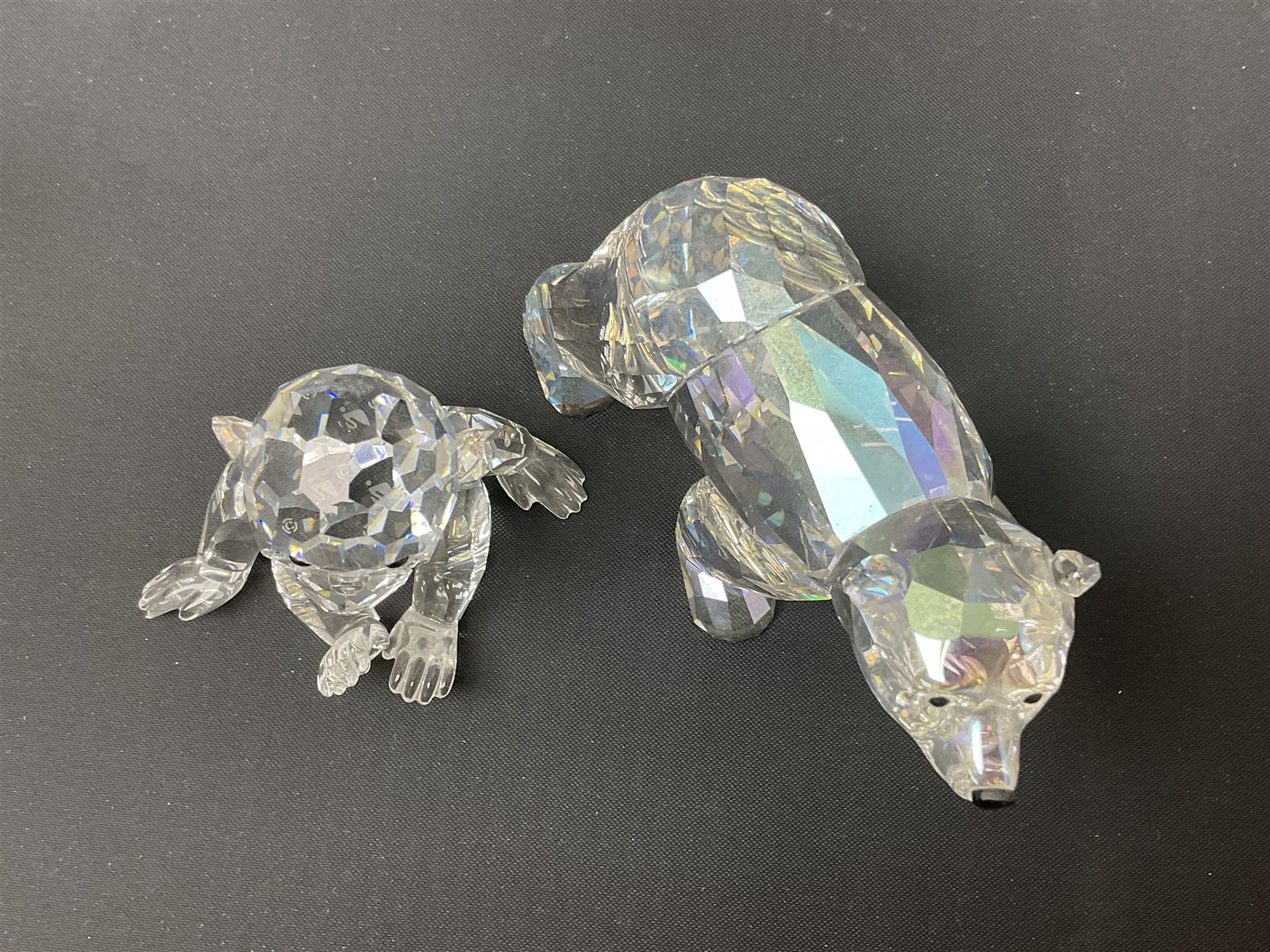 Twenty nine Swarovski Crystal animals, to include koala and baby, in frosted tree branch, elephants, polar bears, squirrel, monkeys, panda, unicorn and snails, etc 