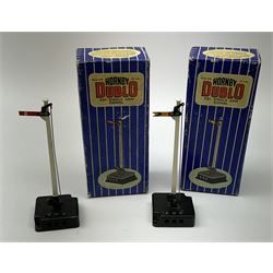 Hornby Dublo - fifteen electric semaphore signals comprising three ED1 Single Arm; two ED2 Double Arm; one ED3 Junction Signal Upper Quadrant; two ES6 Colour Light Signal - Single (Home); and three Colour Light Signal - Junction (Home); all boxed; together with four unboxed electric signals (15)