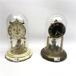 Late 20th century Kundo anniversary clock, Arabic dial, cream painted and decorated with flowers and another late 20th century anniversary clock with black dial, both under glass domes