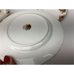 Royal Albert Old Country Roses pattern tea set, comprising teapot, coffee pot, six teacups and six saucers, five side plates, further teacup with joined saucer and side plate, open sucrier, milk jug, cake plate, and preserve pot and cover, together with Royal Albert Jubilee Rose pattern sauce boat and stand, and Royal Albert Lavender Rose pattern cake stand. 