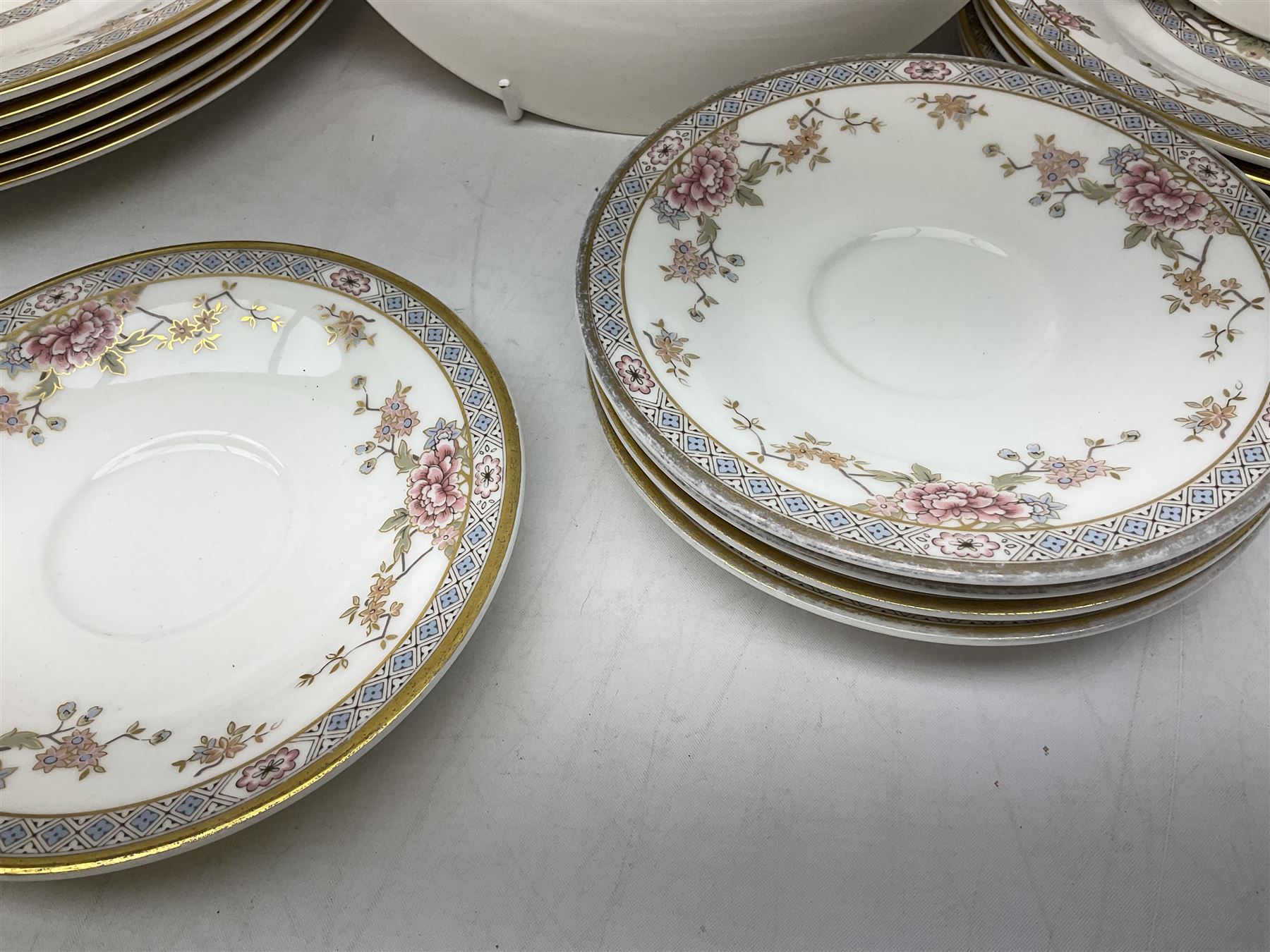 Royal Doulton Canton pattern tea and dinner wares comprising teapot, milk jug, twin handled lidded sucrier, cake plate, six dinner plates, six side plates, five smaller plates, five saucers and pair of candlestick holders, together with Sevres clear glass decanter with faceted sides and stopper, all with marks beneath