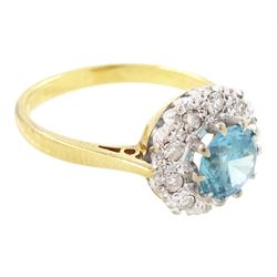 18ct gold blue zircon and diamond cluster ring, single round cut blue zircon surrounded by ten single cut diamonds, London 1965