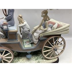 Large Lladro figure, The Landau Carriage, modelled as a horse drawn open top carriage, on a mahogany base, no 1521, sculpted by Juan Huerta, year issued 1987, year retired 1998, H30cm 