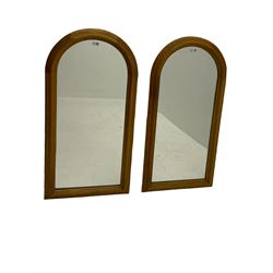 Pair arched top mirrors, in moulded oak frames (54cm x 107cm), and another oval mirror