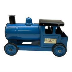 1950s Triang pressed steel milk float, containing twenty eight plastic milk bottles with coloured tops, together with a 1950s Triang pressed steel locomotive 'Triang Express', tallest H21cm