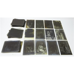  Collection of early 20th century 1/2 plate glass negatives of mainly portraits and Buildings, approx 50   