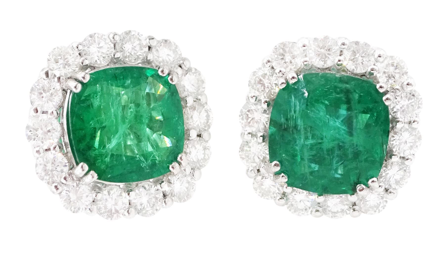 Pair of 18ct white gold cushion cut emerald and round brilliant cut diamond cluster stud earrings, stamped, total emerald weight approx 6.20 carat, total diamond weight approx 1.90 carat