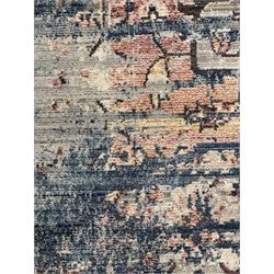 Contemporary Dunelm Soraya Persian design rug, blue and beige ground with faded floral and vine motifs, central medallion and trailing foliate patterns, bordered by a distressed design with stylised floral motifs