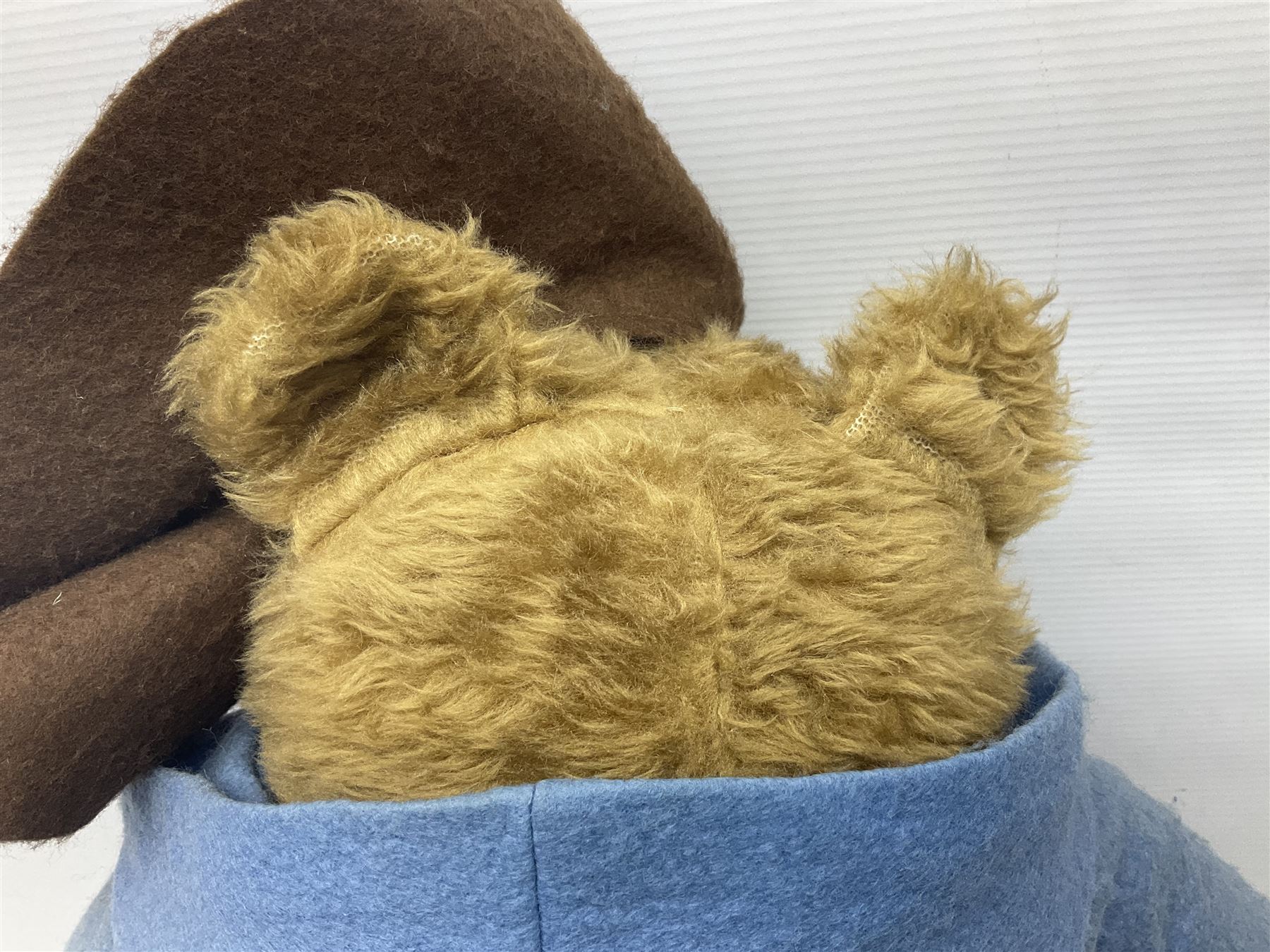 Paddington Bear with plush covered body, brown felt hat, pale blue duffle coat and blue wellingtons H54cm
