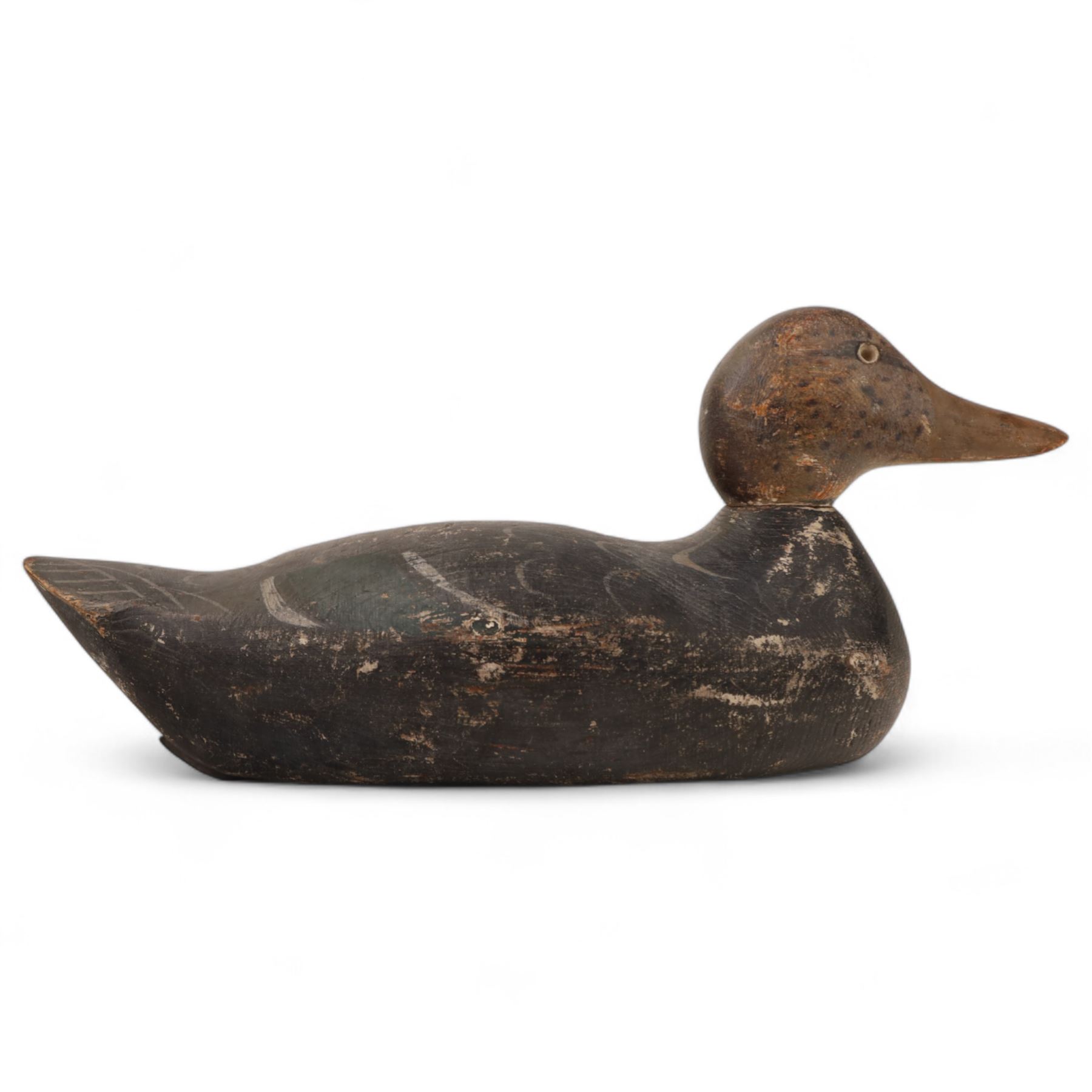 Early 20th century American carved wooden decoy duck, with weight beneath marked CJ Raymond Lead Co Chicago, H19cm, L40cm