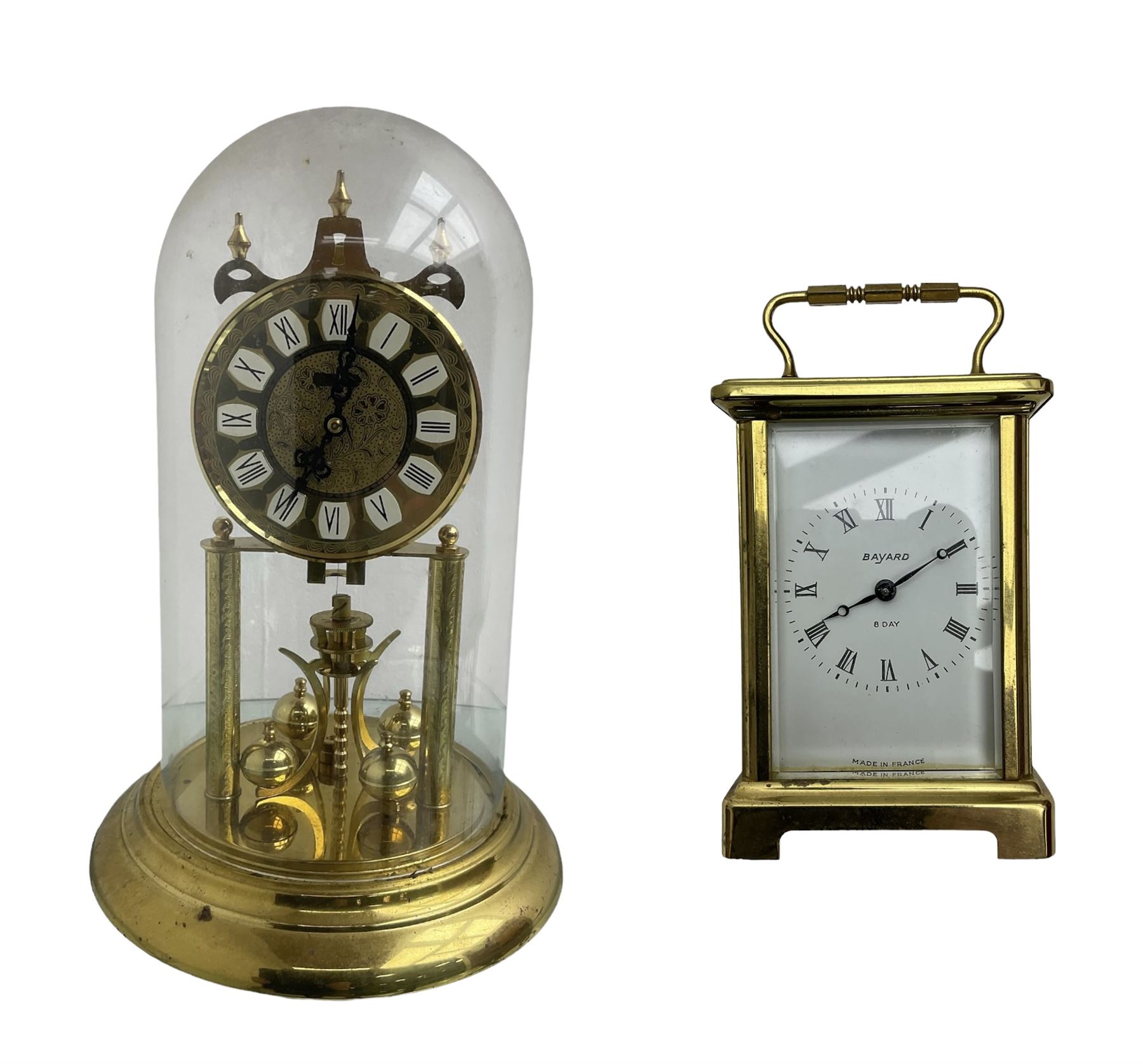  20th century French cornice “Bayard” 8-day timepiece carriage clock, with a lever platform escapement, enamel dial with roman numerals and minute track and Haller Torsion clock with acrylic dome
