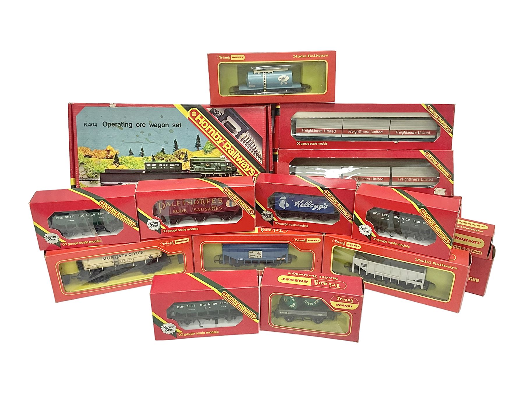 Hornby/Tri-Ang ‘00’ gauge - fifteen goods wagons to include freightliners with containers, ore wagons, closed vans etc; together with R404 Operating ore wagon set; all boxed (16) 