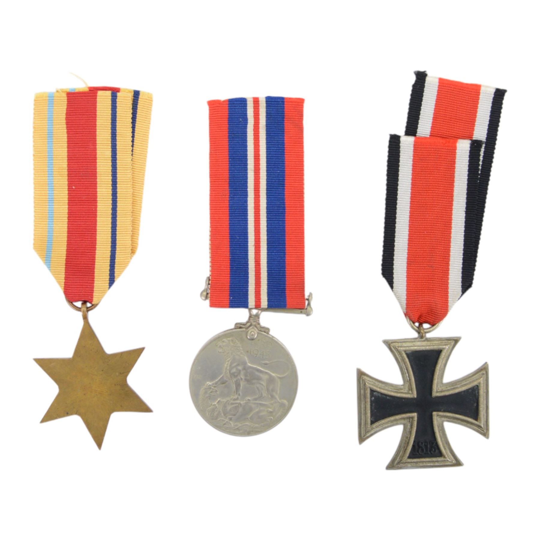 WWII  duo of medals, comprising Defence medal and The African Star, together with Iron Cross 2nd class medal
