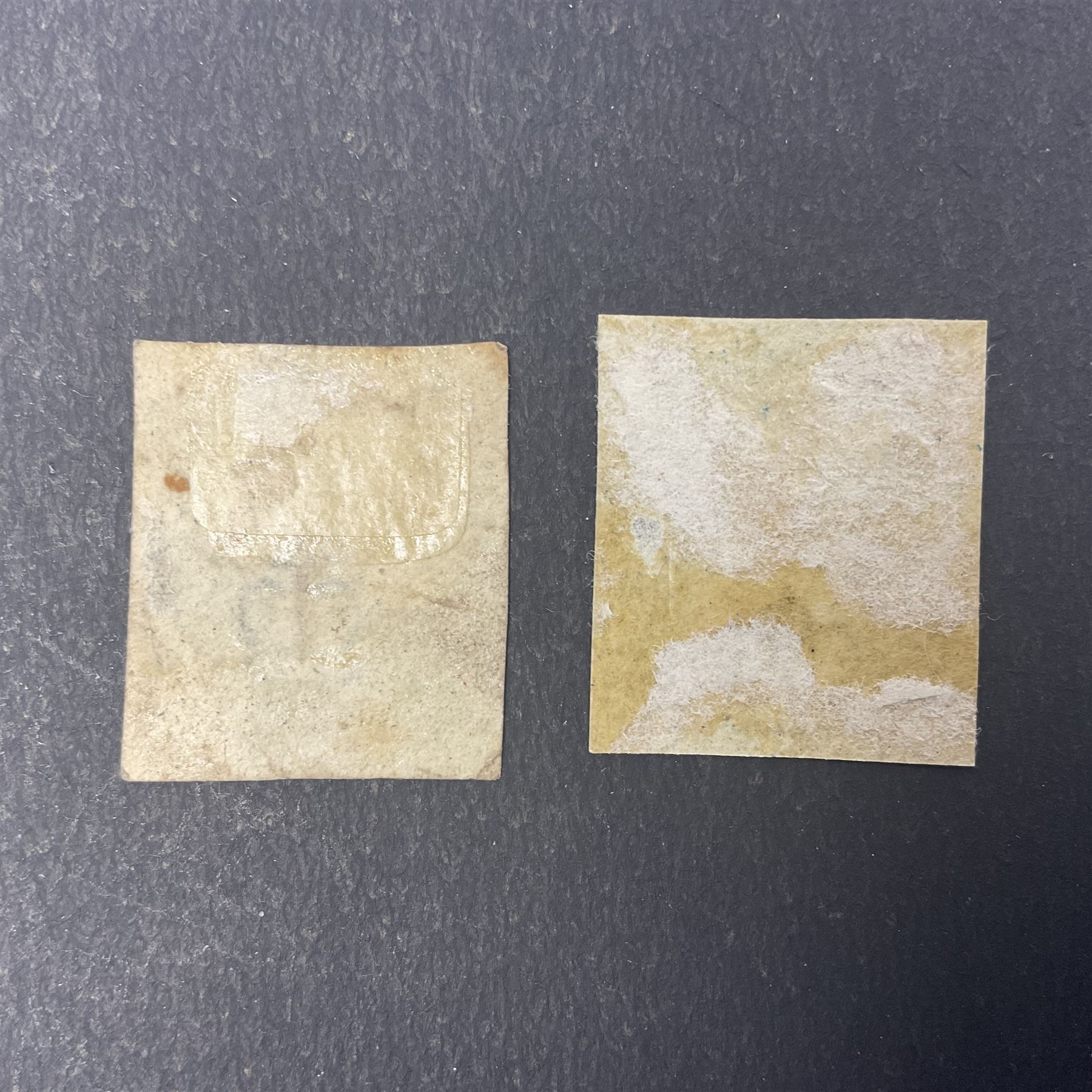 Great Britain Queen Victoria penny black stamp with red MX cancel and 1840 two pence blue stamp with black MX cancel