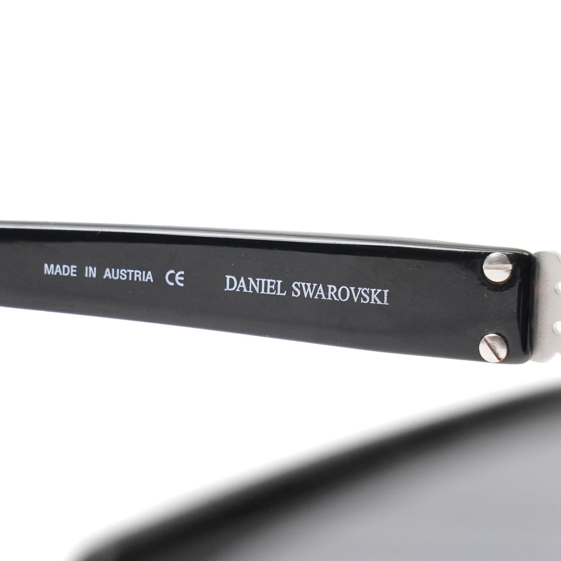 Daniel Swarovski - black acetate sunglasses with dark tinted lenses and crystal-set silver-tone panels to the temples, signed to the arm interior