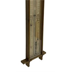 Admiral Fitzroy - Early 20th century Fitzroy barometer in a glazed gothic influenced oak case with chamfered uprights and top and base panels, full length paper scales with Fitzroy's observations and predictions, mercury bulb cistern, storm glass, spirit thermometer and brass sliding vernier pointers. Retailed by Inglis & Son, Coney Street, York.