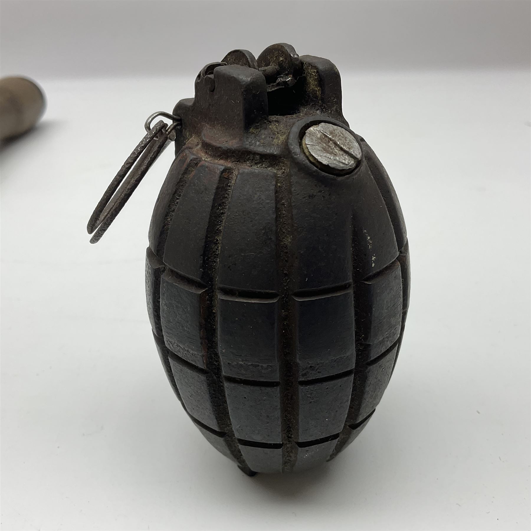 WW1 practice Mills bomb stamped 'A.L. & Co 1917 No.23 Mk.II' H10cm; and reproduction WW2 German stick grenade (2)