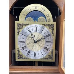 Late 20th century inlaid mahogany longcase clock, swan neck pediment over stepped arch glazed door, the trunk inlaid with foliage and flower heads, moon phase dial, twin train driven movement striking on bell