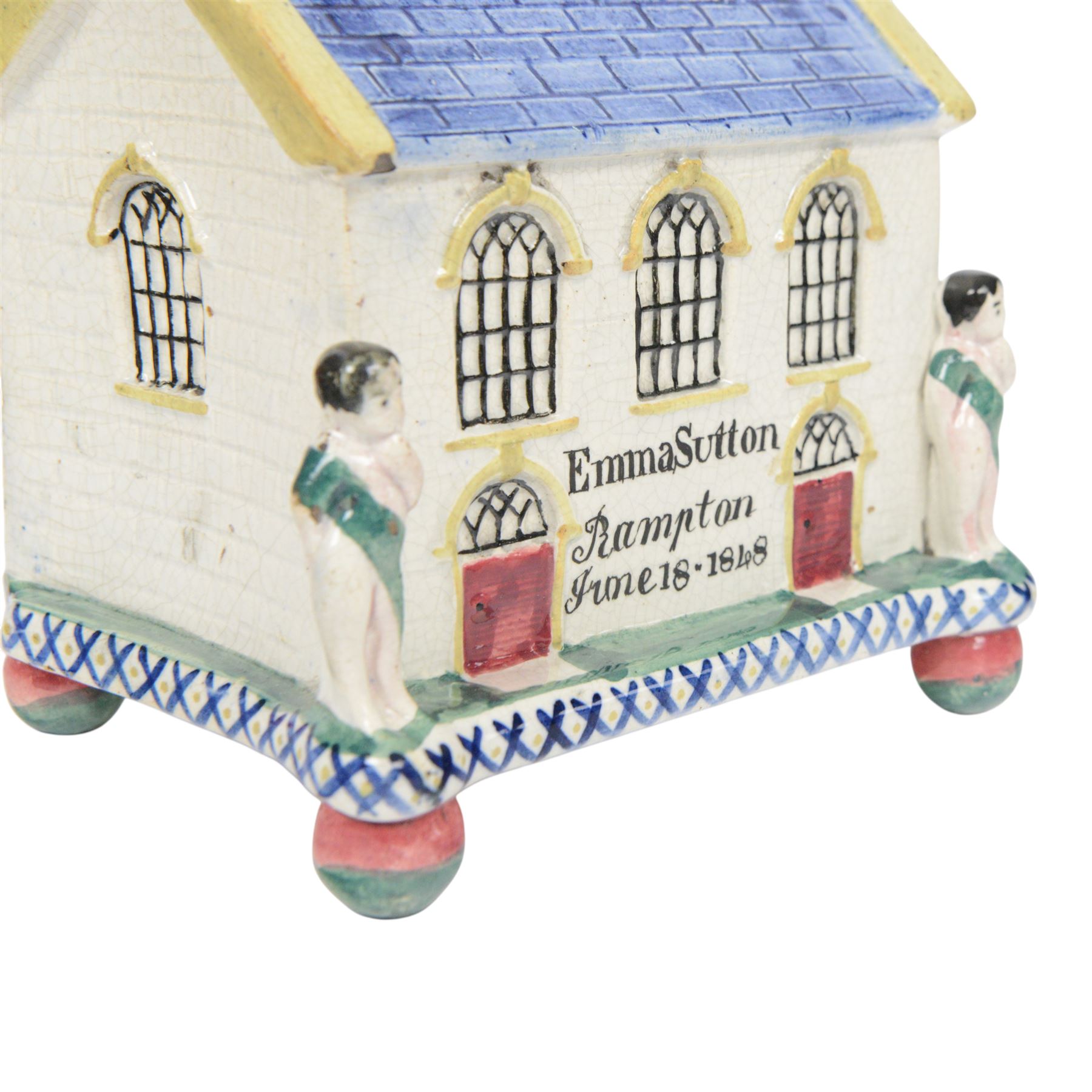 Mexborough Prattware Wesleyan Chapel Money Box, 1848, typically modelled as a chapel with putti to the front corners, on ball feet, inscribed  to the front Emma Sutton Bampton June 18 1848, H17cm, L15cm