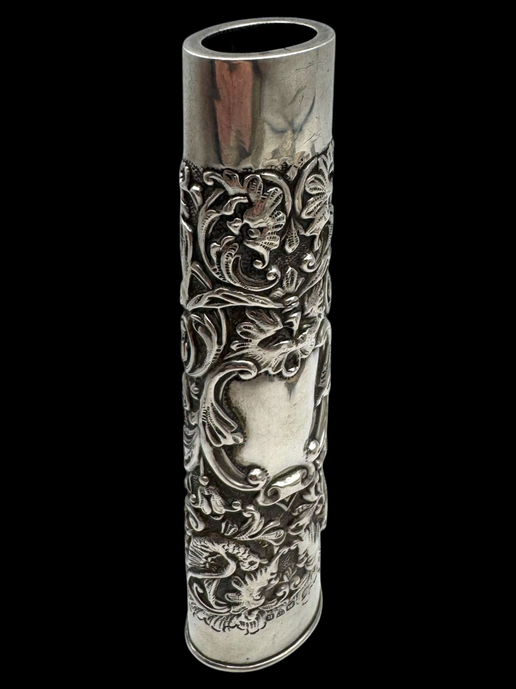 Group of silver, including glass jar with silver lid, pierced pin tray, vase sleeve and two silver lids, all hallmarked 