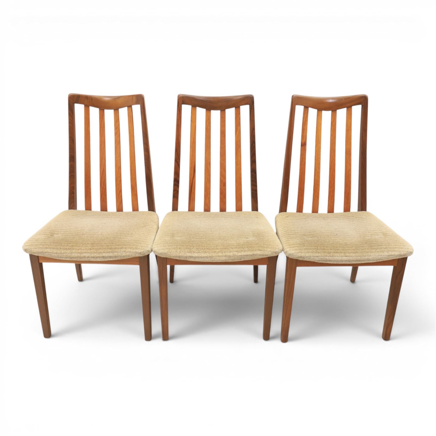 G-Plan - mid-20th century teak 'Fresco' circular extending dining table and six chairs, circular top with storable fold-over leaf extending to 166cm
