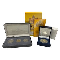 The Singapore Mint 2000 sterling silver proof one thousand five hundred Rs coin and an Australian Centenary of Federation 2001 three- coin set, both cased with certificates