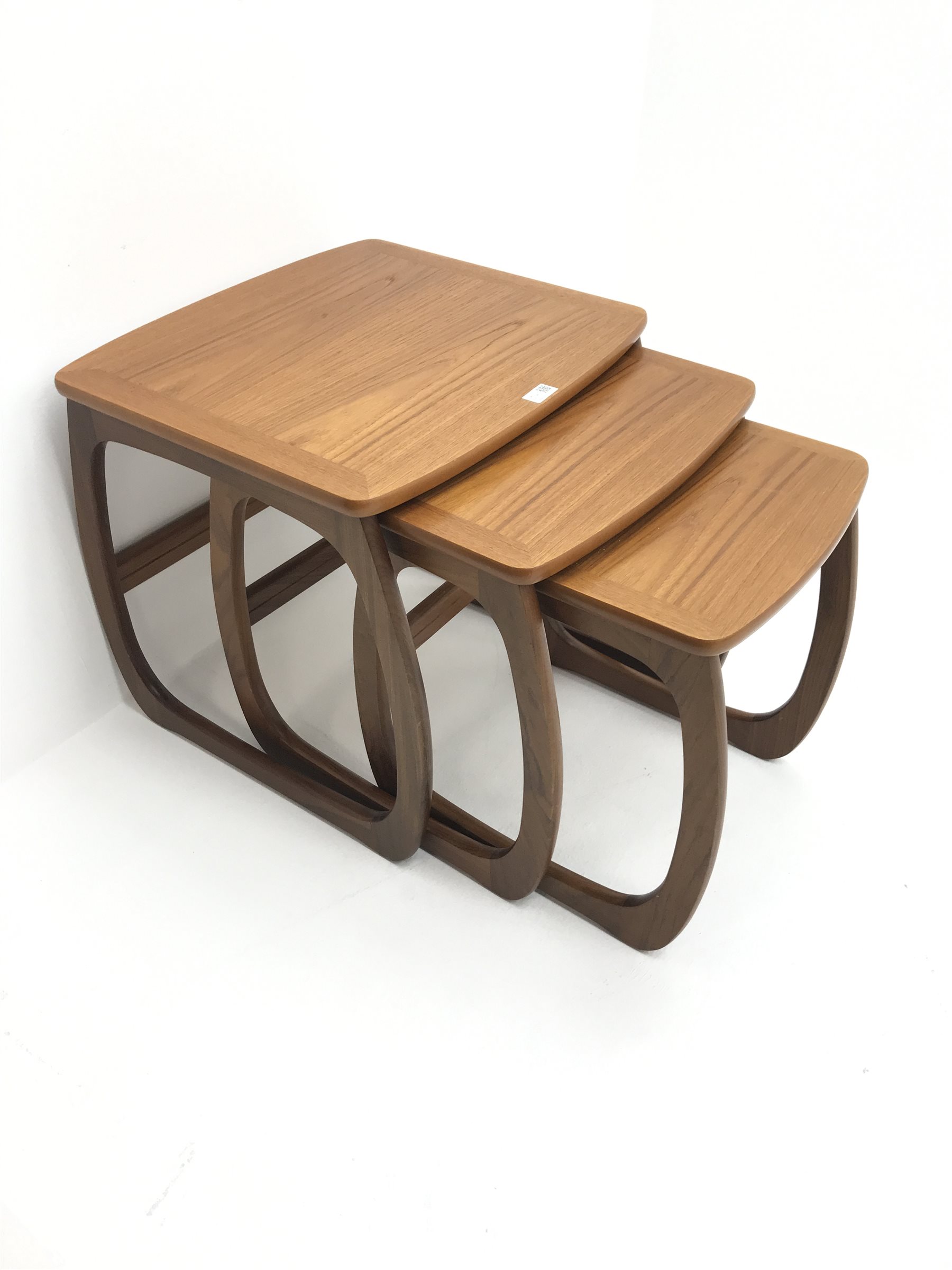 Parker Knoll teak coffee table with through drawer (107cm x 46 cm, H50cm), and a matching nest of three tables 