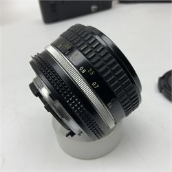 Nikon F3T camera body, in champagne/ titanium colourway, serial no. T8215031, with 'Nikon Nikkor 50mm 1:1.4' lens, Nikon MD4 motor drive, serial no. 156592 and Nikon MK-1 Firing range converter, all with original boxes 