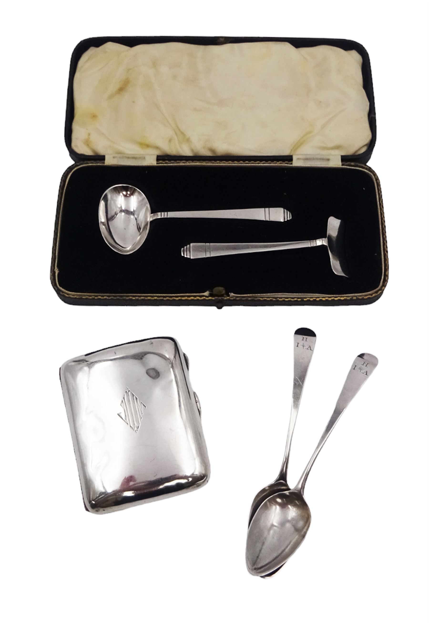 1920s silver cigarette case, of typical form, with engraved lozange to cover, hallmarked Charles Edwin Turner, Birmingham 1920, together with a pair of George III silver Old English pattern teaspoons, with engraved initials to terminal, hallmarked Peter, Ann & William Bateman, London 1803 and a cased spoon and pusher, hallmarked 