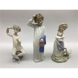 Lladro figure of a girl brushing her hair, together with four Nao figures and Tengra figure