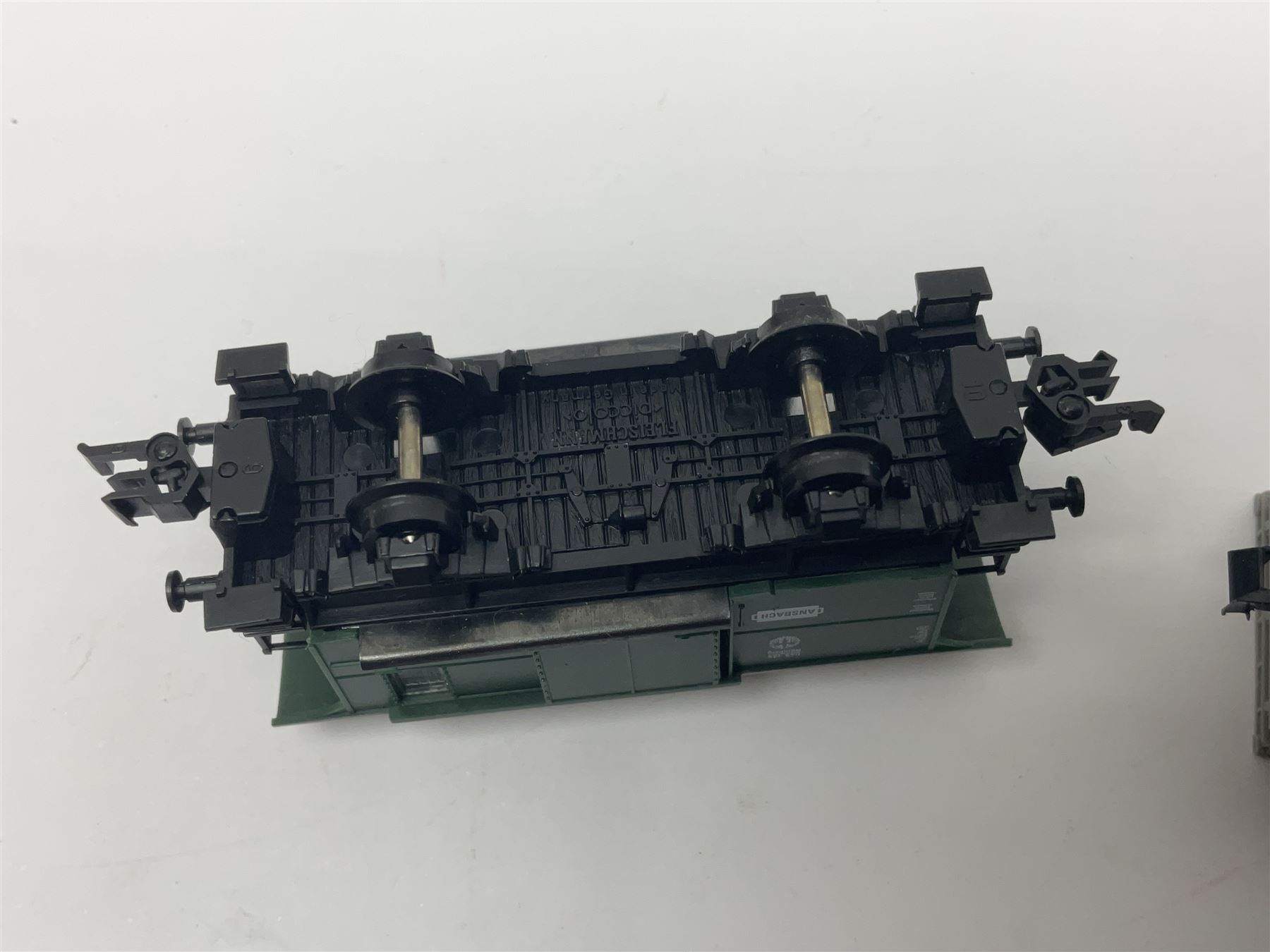 Fleischmann ‘N’ gauge ‘Piccolo’ - sixteen carriages, wagons and cars comprising nos. 8051, 8052, 8055, 8064, 8119K, 8127, 8128, 8129, 8202, 8211, 8224, 8240, 8281, 8301, 8500, 9372; along with Minitrix N503 Shock Van and 13576 6 ton Mineral Wagon; boxed and loose (18) 