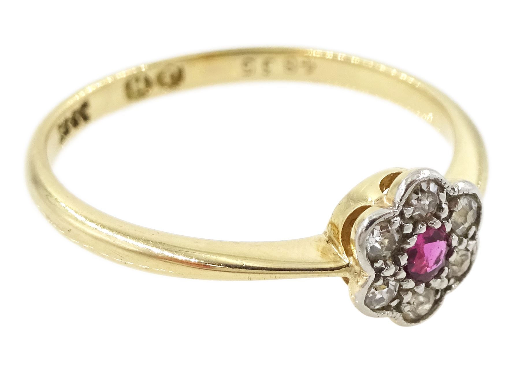 Early 20th century gold ruby and old cut diamond flower head cluster ring, stamped 18ct