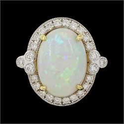 18ct white gold opal and diamond cluster ring, single cabochon cut opal of approx 5.20 car...