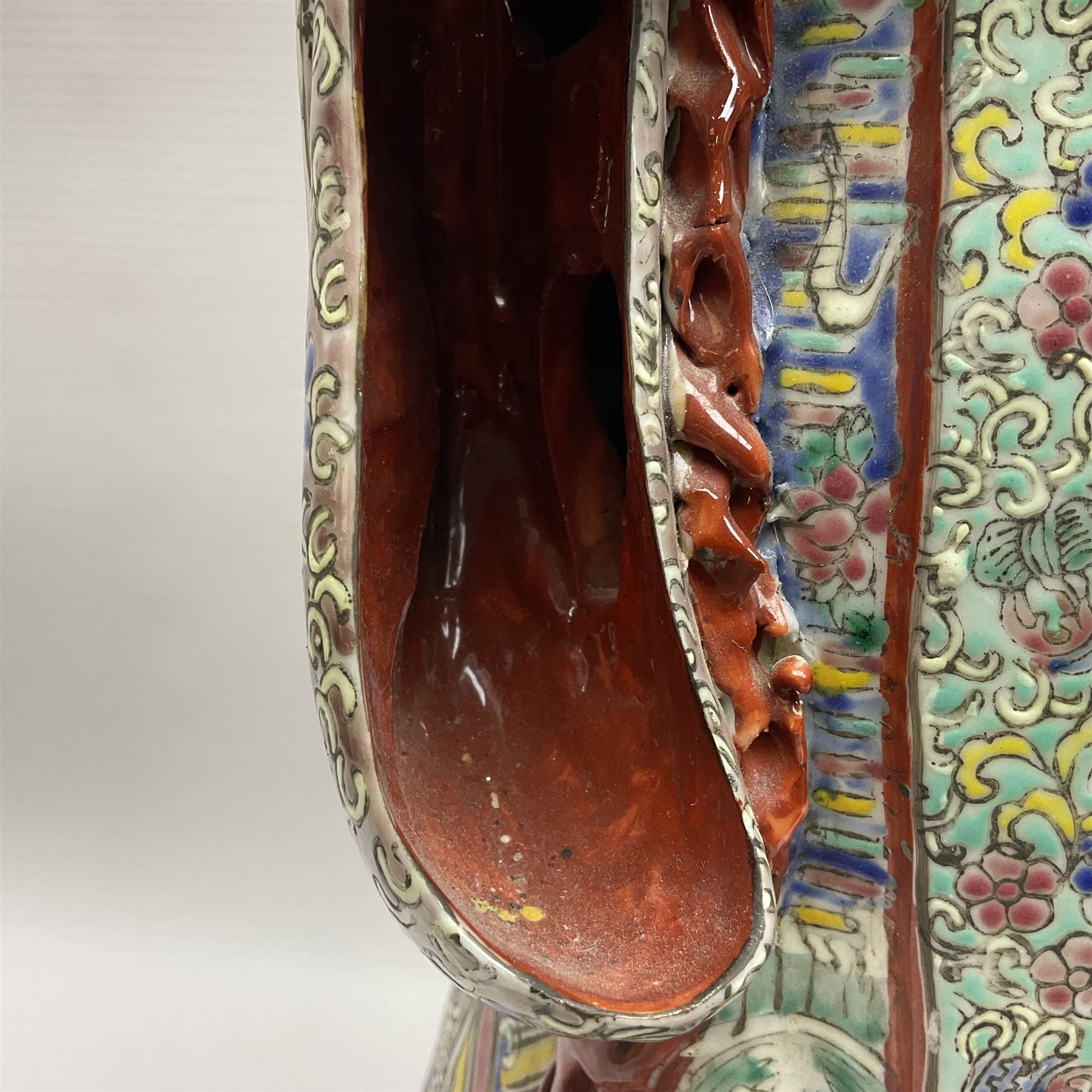 Chinese Republic Period porcelain figure, modelled as Shoulao, wearing elaborately enamelled robes decorated with peaches and flower heads, with impressed mark beneath, H55cm