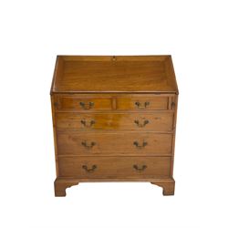 Georgian design mahogany bureau, fall-front enclosing fitted interior with satinwood strung drawers, above two short and three long drawers, on bracket feet