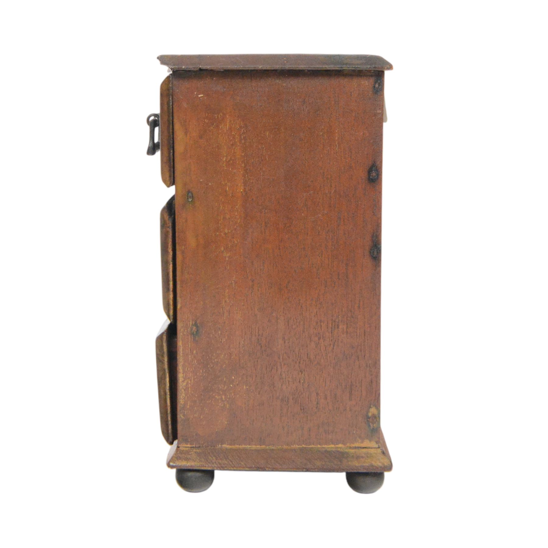 Table top chest of drawers, of rectangular form, with two short and two long drawers, raised upon bun feet, H22cm
